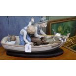 A Lladro group on stand, fishing with Gramps, length 15"