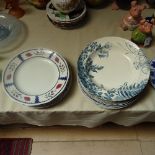 A Collection of decorative soup dishes and dinner plates