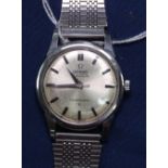 A gent's stainless steel-cased Omega Constellation watch, with silver baton dial, automatic