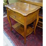 A French walnut work table, with rising lid revealing a fitted interior, with drawer under, on