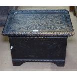A small 1920s carved oak coffer, W51cm