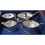 A silver plate on copper 4-piece tea set