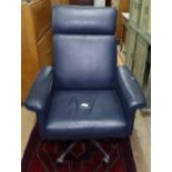 A Danish Cado Jupiter blue leather tilt and swivel chair, with height adjust, designed by CWF