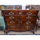 A 19th century Dutch mahogany wash stand, with fold-out top, dummy drawer fronts under, on bracket