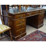 An Edwardian mahogany twin-pedestal writing desk, W153cm