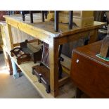 A large pine kitchen table on square legs, L180cm, D79cm, H78cm