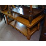 A modern rectangular oak 2-tier coffee table, on baluster turned legs, 116cm