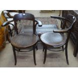 Mundus and J&J Kohn, Czechoslovakia, a pair of bentwood elbow chairs, with stamped marks and paper