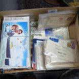 A box with stamped postcards, presentation packs etc