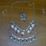2 sterling silver and stone-set daisy design necklaces, together with a similar brooch