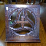 A Victorian Gothic carved oak table-top book rest
