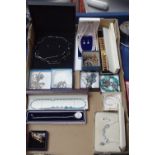 A box containing silver and other costume jewellery