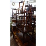 A reproduction yew wood drum table, a pair of Edwardian hall chairs, a mahogany 2-tier occasional