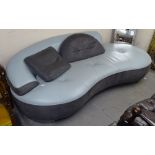 An Italian blue and grey leather upholstered settee, with 2 loose cushions, L250cm