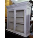 A white painted 2-door medical cabinet, W77cm