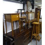 An Edwardian oak sewing table, a walnut nest of 3 tables, a folding tea trolley, a spinning stool, a