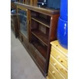 A large late Victorian mahogany bookcase, with 2 sliding glazed doors, adjustable shelves and