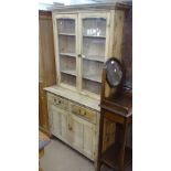 An Antique pine 2-section kitchen dresser, W106cm, h200cm