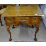 An 18th century crossbanded walnut lowboy, with 3 short drawers, on cabriole legs, W77cm