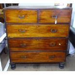 A 19th century teak 2-section military chest, with recessed brass handles on turned bun feet,