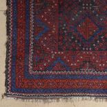 A small Antique red ground Persian rug, 115cm x 80cm