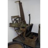 A collection of Vintage cast-iron tools, a garden chair etc