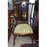 A stained beech stickback elbow chair on turned legs