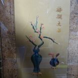 An Oriental hardstone picture of blossom in faux bamboo frame, height 18.5"