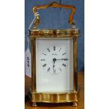 A Henley brass carriage clock.