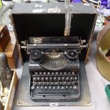 An early Olympia portable typewriter in case