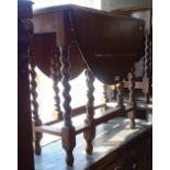 A small oak oval gateleg table, with barley twist legs