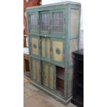 A Vintage painted kitchen cabinet, with glazed and panelled sliding doors, W113cm, H184cm