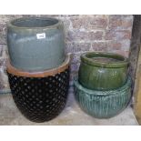 3 small green glazed garden planters, and another