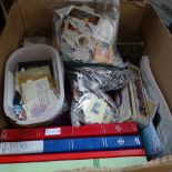 A boxful of stamp albums and loose stamps