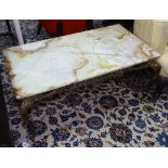 A rectangular onyx-top coffee table on gilt-metal base, W66cm