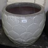 A grey glazed textured garden plant pot