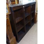 A large oak open bookcase, with adjustable shelves and applied decoration, L155cm, H124cm, D32cm,