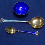 2 silver-gilt and enamelled spoons with crown finials, and a silver and blue enamel bowl