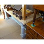 A large polished and painted pine kitchen table, on H-shaped stretcher, L200cm, D90cm, H79cm