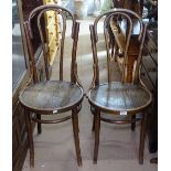 A pair of Eastern European bentwood side chairs, with remains of paper label to the underside of 1