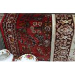 2 small Persian design rugs