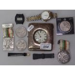A silver-cased pocket watch, wristwatches, medals etc