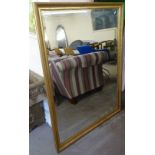 A modern gilt-framed bevelled-edge wall mirror, L130cm, H100cm