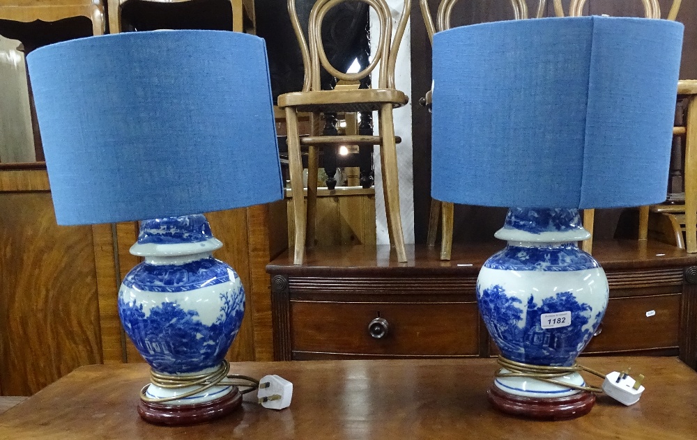 A pair of modern blue and white table lamps and shades, height including shade 50cm