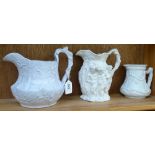 A bacchanalian scene jug, 7.5", a Victorian Minton jug, and another