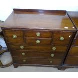 A Waring & Gillow Ltd mahogany chest, with 7 fitted drawers on bracket feet, W93cm, H100cm