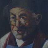 A small Antique oil on panel, portrait of a man in glasses, indistinctly signed, in ebony frame