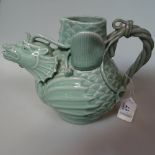 A Chinese turquoise-glaze porcelain dragon design flagon, height 17cm