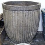 A large fluted garden plant pot, H62cm