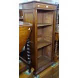 A French walnut open bookcase, of narrow size, with adjustable shelves, on bun feet, W50cm